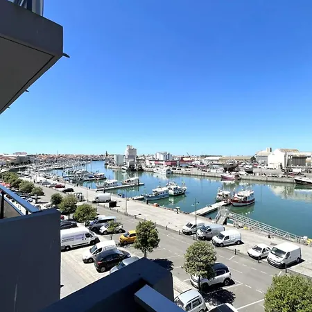 Pretty And Bright With View On The Harbor